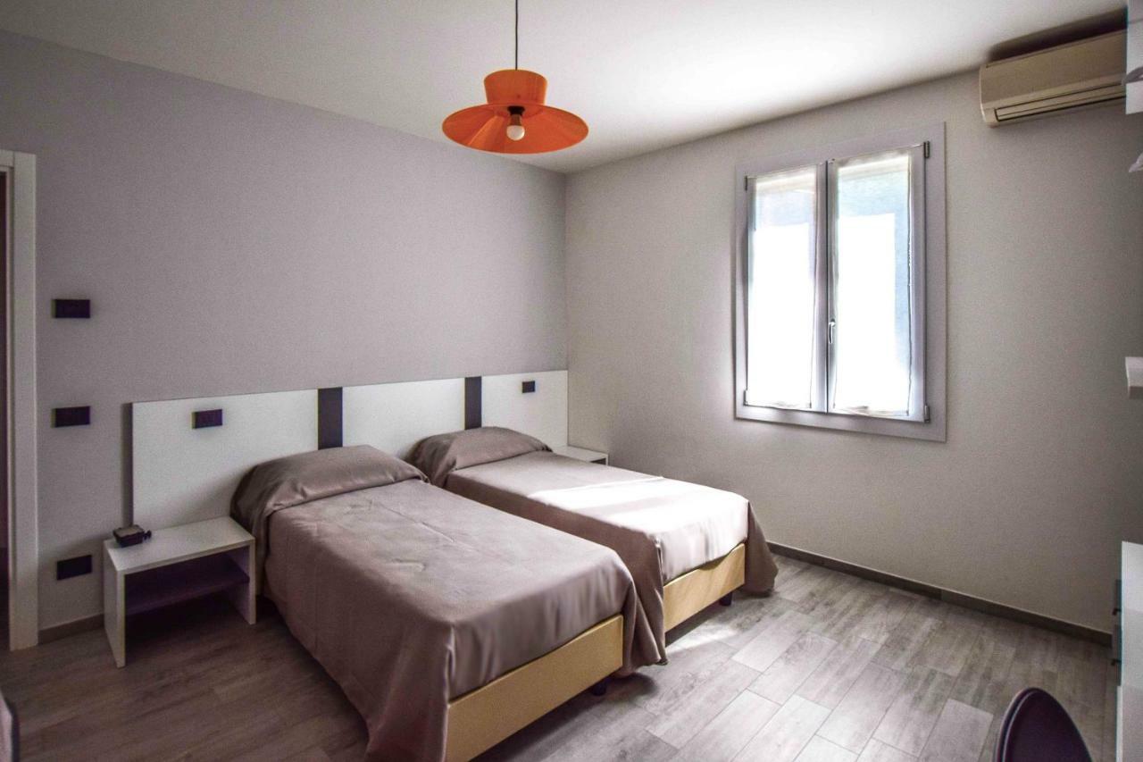 Gambisa Street Hotel Soliera Екстериор снимка